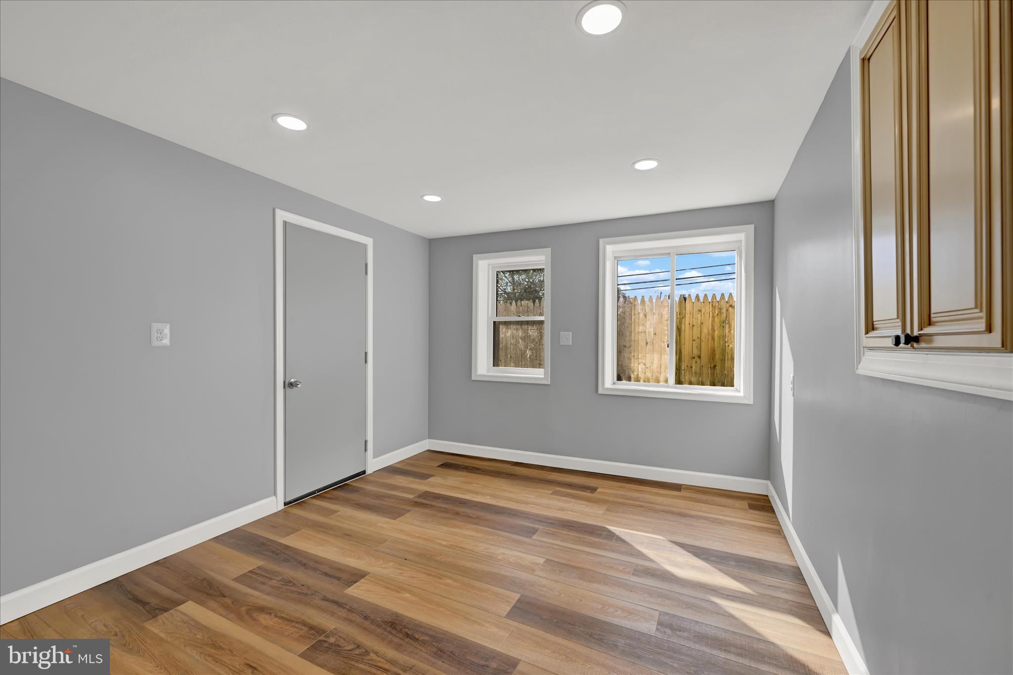2 Armor Court Baltimore, MD 21220 - Photo 23 of 33 a view of empty room with wooden floor and fan
