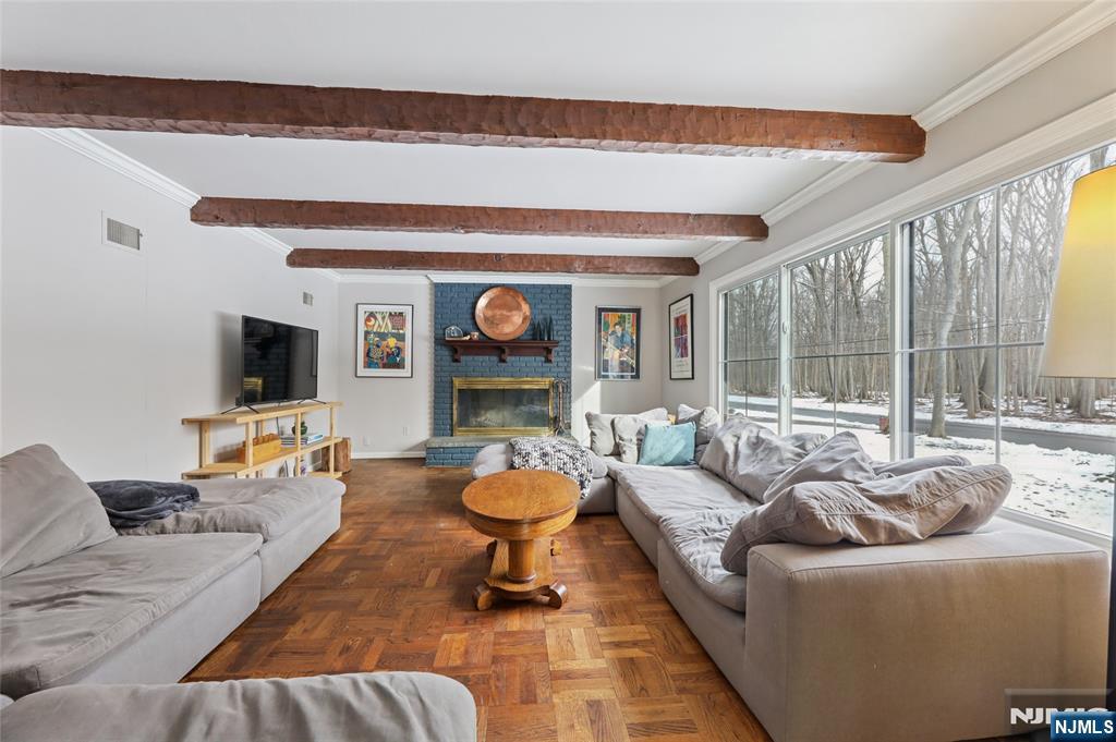 320 Park Street Haworth, NJ 07641 - Photo 12 of 48 a living room with furniture and a flat screen tv