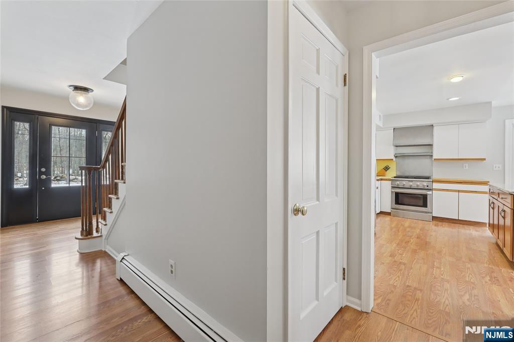 320 Park Street Haworth, NJ 07641 - Photo 22 of 48 a view of a kitchen with wooden floor and electronic appliances