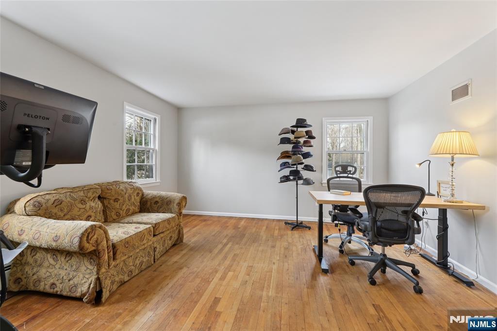 320 Park Street Haworth, NJ 07641 - Photo 25 of 48 a living room with furniture and a wooden floor