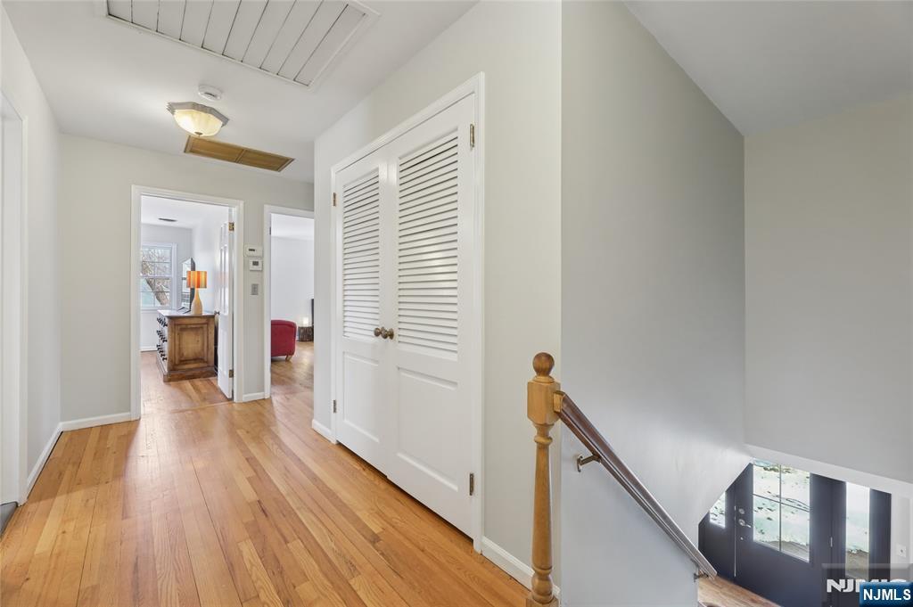 320 Park Street Haworth, NJ 07641 - Photo 27 of 48 a view of a hallway with wooden floor and staircase