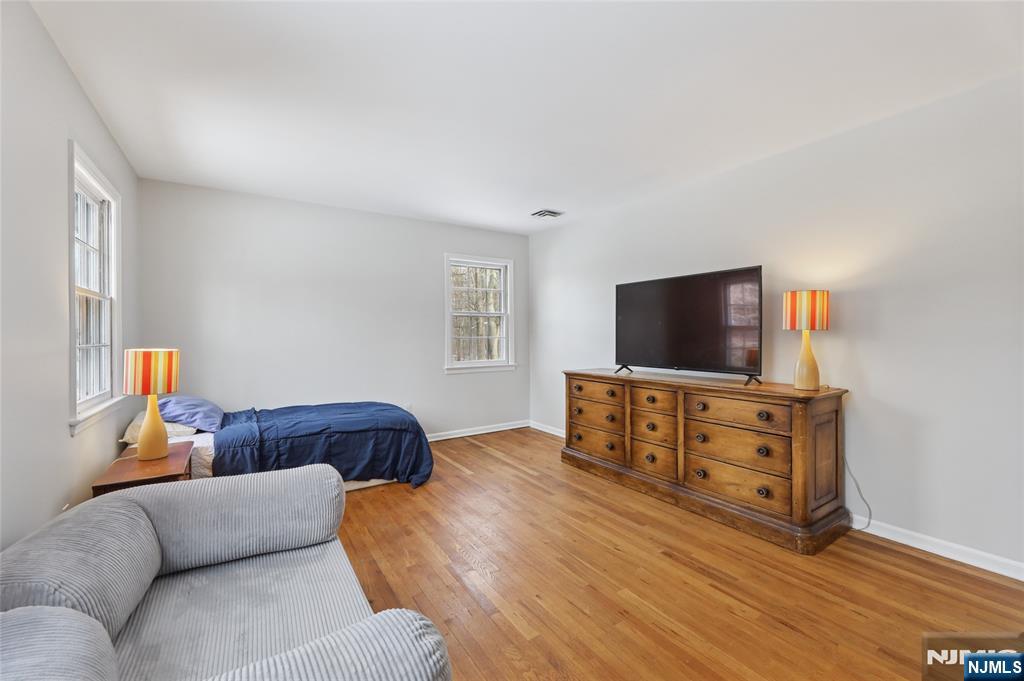 320 Park Street Haworth, NJ 07641 - Photo 38 of 48 a living room with furniture and a flat screen tv