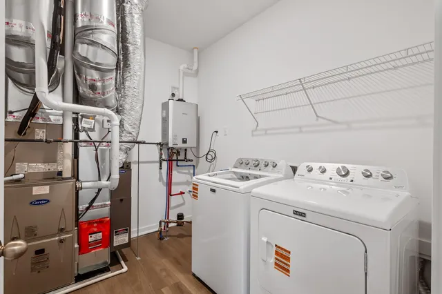 a utility room with dryer and washer