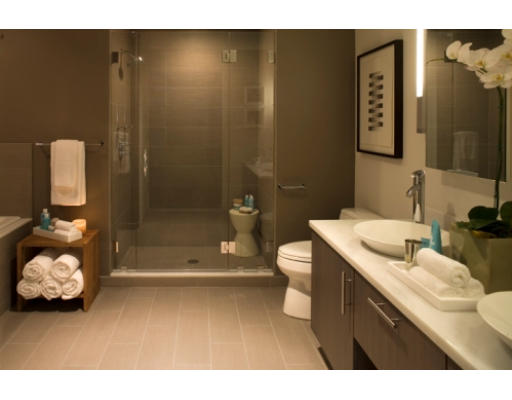 110 Stuart Street, Unit 19F Boston, MA 02116 - Photo 13 of 13 a bathroom with a sink toilet and shower