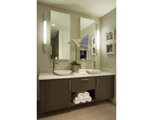 110 Stuart Street, Unit 19F Boston, MA 02116 - Photo 9 of 13 a bathroom with a sink and a mirror