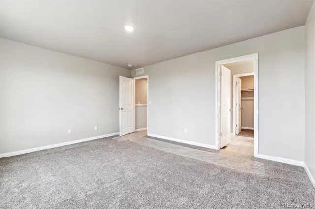 an empty room with an entryway
