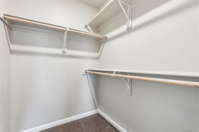 a view of an empty walk in closet