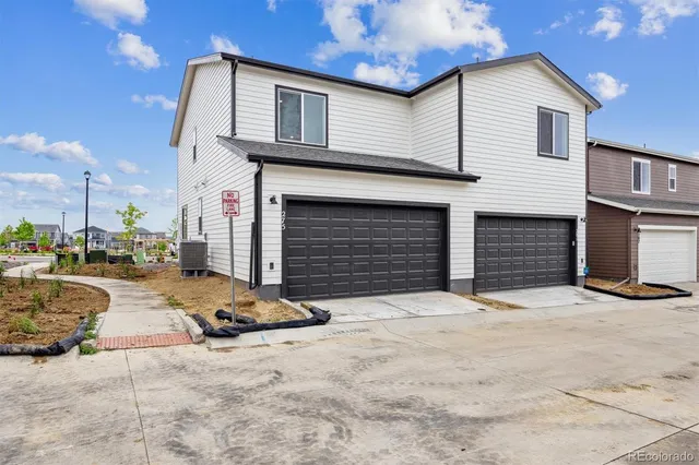 a front view of a house with a patio