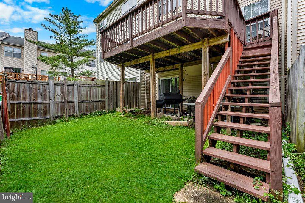 11409 Hermosa Drive Laurel, MD 20708 - Photo 28 of 28 a view of a backyard with a deck