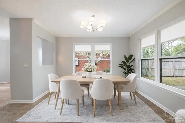 a bedroom with a bed and a table in it