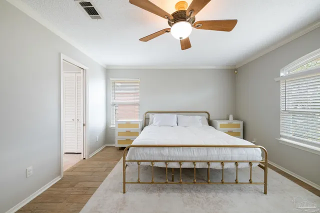 a bathroom with a sink vanity and a mirror