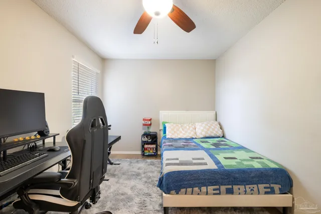 a bathroom with a sink a large mirror and a shower