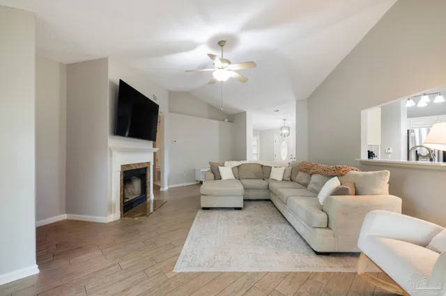 a kitchen with stainless steel appliances a refrigerator and cabinets