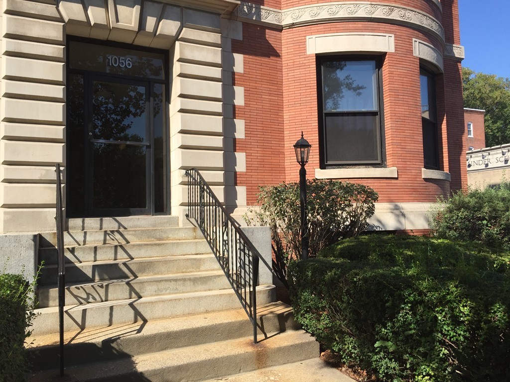 1056 Beacon Street, Unit 15 Brookline, MA 02446 - Photo 2 of 9 a view of a entryway door front of house