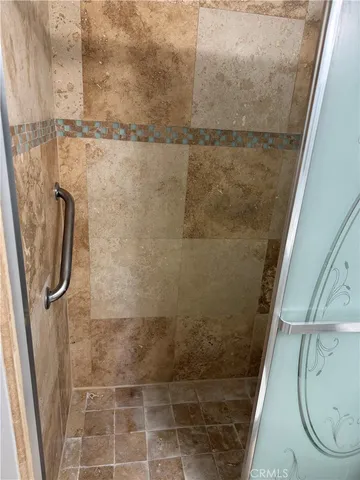 a bathroom with a sink a mirror and vanity