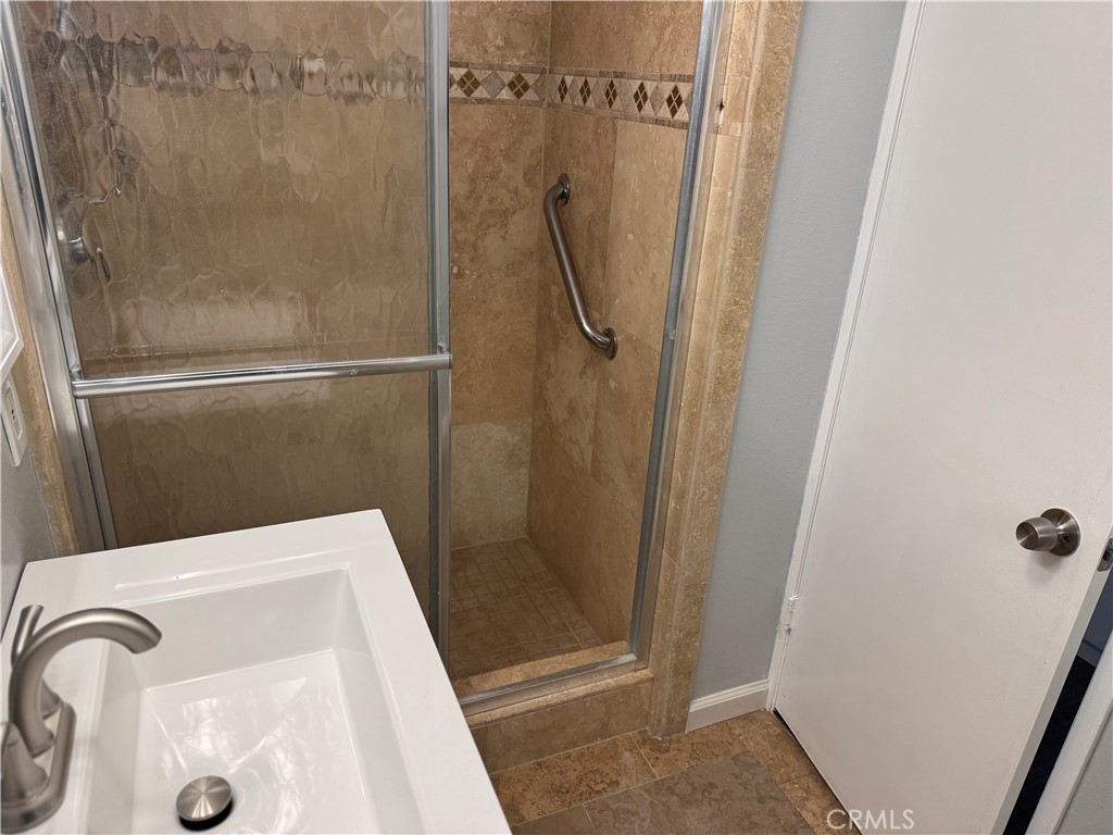 13602 La Jolla Circle, Unit B La Mirada, CA 90638 - Photo 26 of 27 a bathroom with a shower