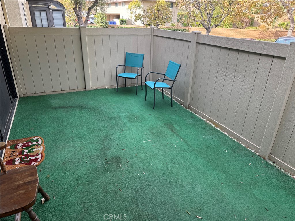 13602 La Jolla Circle, Unit B La Mirada, CA 90638 - Photo 6 of 27 a backyard of a house with table and chairs