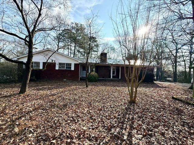 408 Peters Street Calhoun, GA 30701 - Photo 1 of 10 a front view of a house with a yard