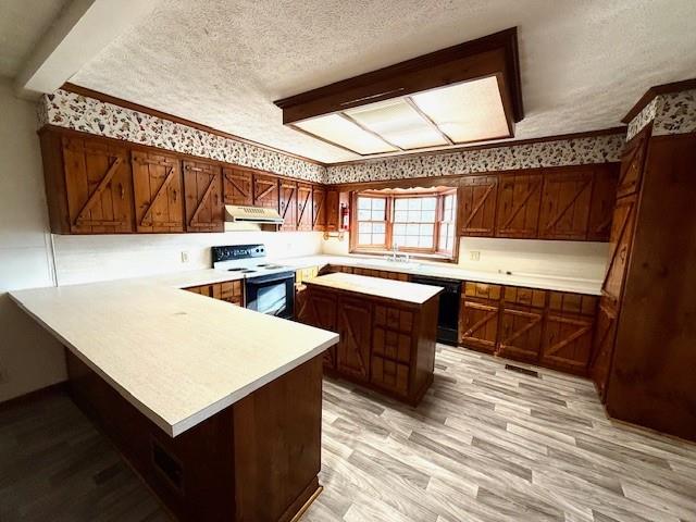 408 Peters Street Calhoun, GA 30701 - Photo 4 of 10 a kitchen with a sink a stove and cabinets