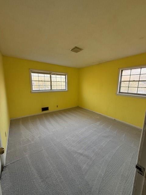 408 Peters Street Calhoun, GA 30701 - Photo 7 of 10 an empty room with windows