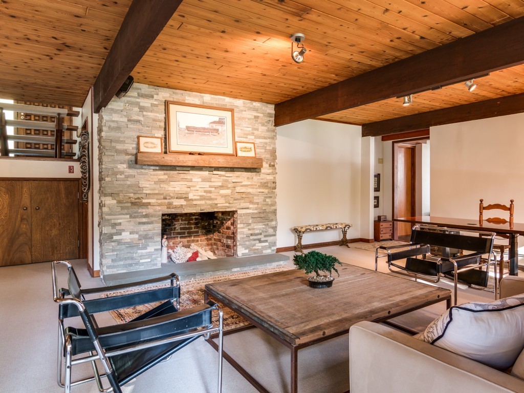 22 Bray Street Gloucester, MA 01930 - Photo 12 of 37 a kitchen with a table chairs and a stove