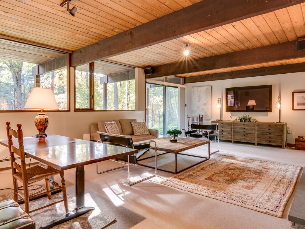 22 Bray Street Gloucester, MA 01930 - Photo 13 of 37 a living room with furniture and a flat screen tv