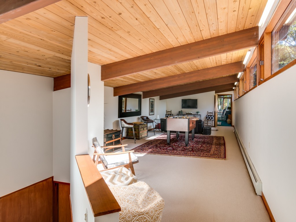 22 Bray Street Gloucester, MA 01930 - Photo 17 of 37 a view of a patio with table and chairs with wooden floor