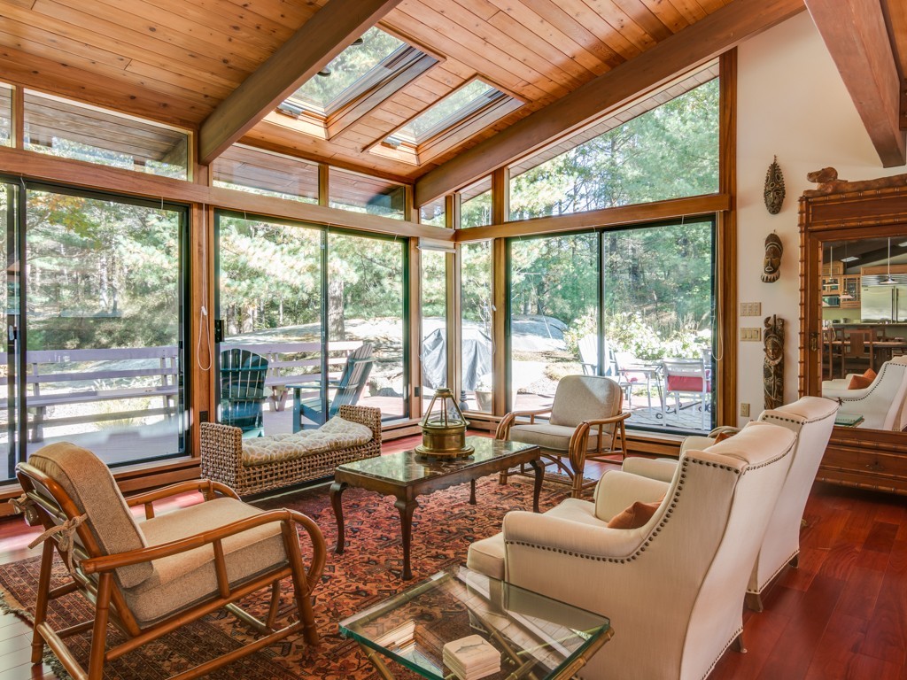 22 Bray Street Gloucester, MA 01930 - Photo 2 of 37 a living room with patio furniture and a floor to ceiling windows