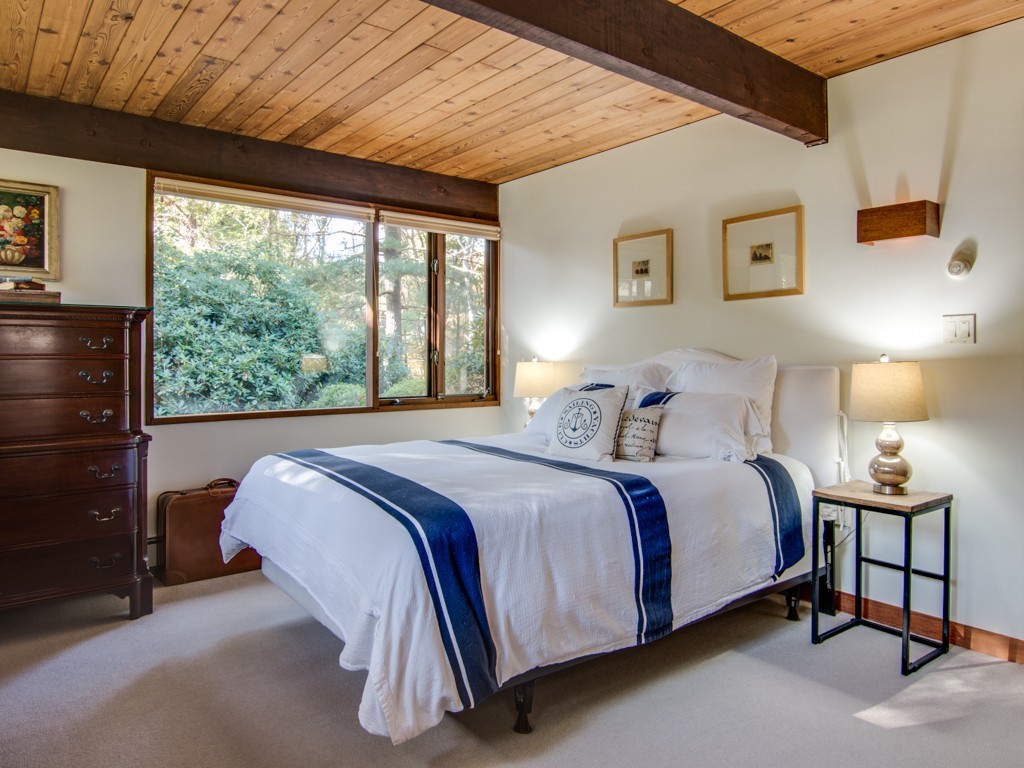 22 Bray Street Gloucester, MA 01930 - Photo 22 of 37 a spacious bedroom with a bed and window