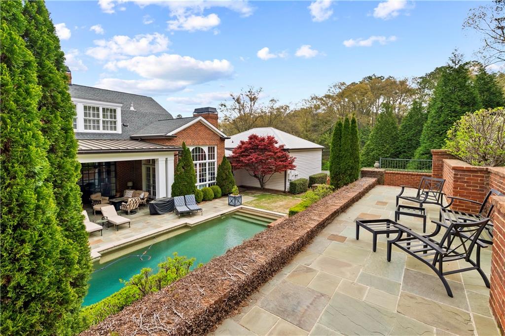 315 East Line Street Calhoun, GA 30701 - Photo 60 of 71 a view of a house with pool and chairs
