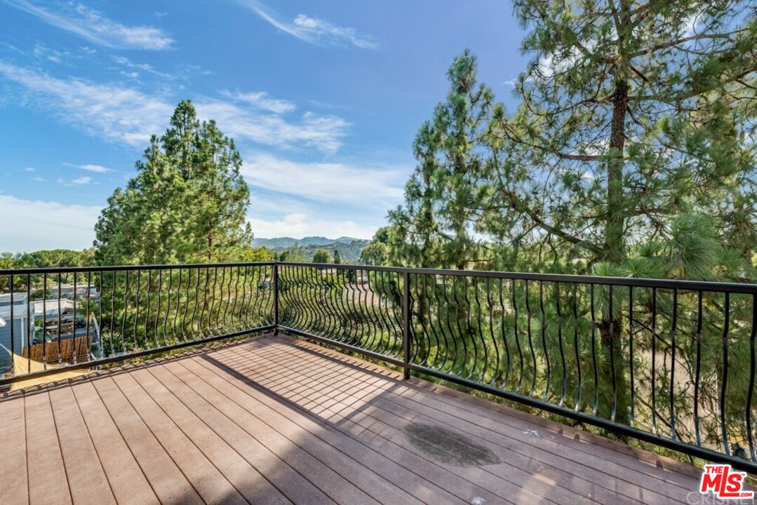 1177 Aztec Topanga, CA 90290 - Photo 24 of 43 a balcony with a yard