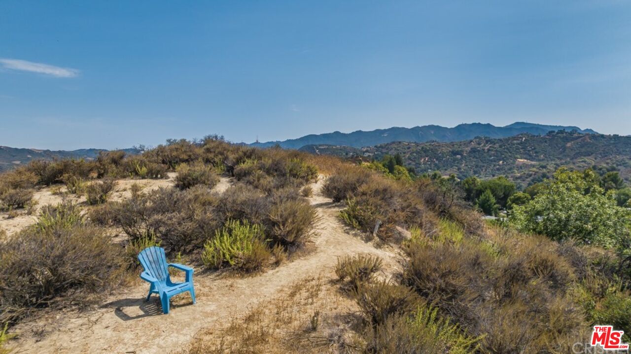 1177 Aztec Topanga, CA 90290 - Photo 36 of 43 a view of a mountain with a tree in the background