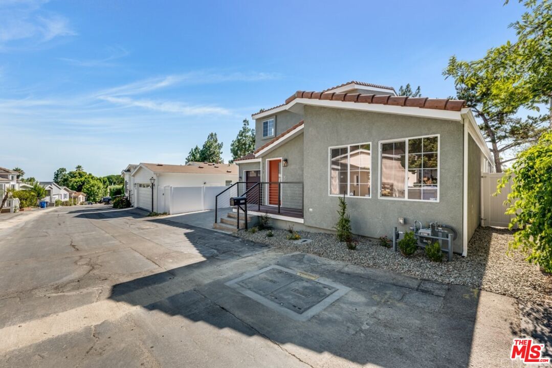 1177 Aztec Topanga, CA 90290 - Photo 43 of 43 a front view of a house with a garage