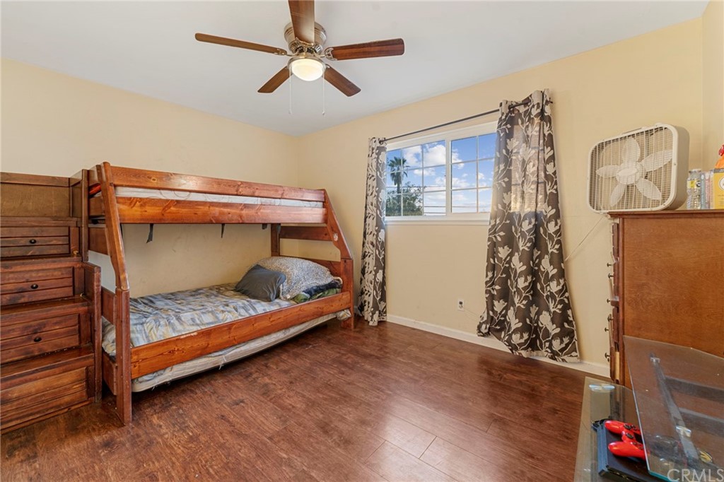 5005 Pearblossom Drive Riverside, CA 92507 - Photo 15 of 19 a bedroom with a bed and a window