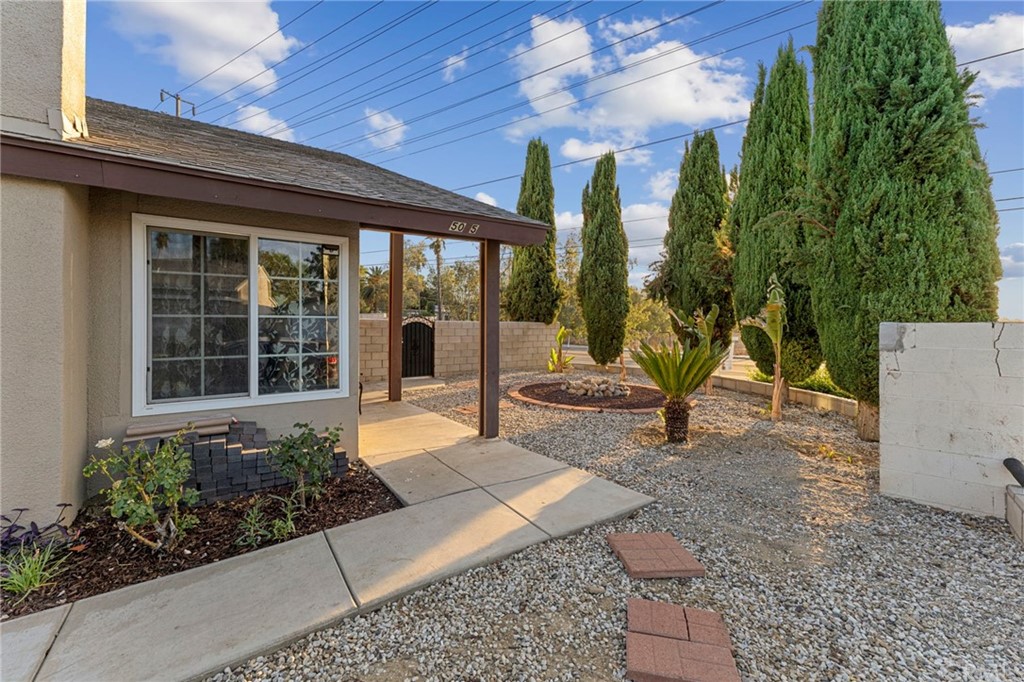 5005 Pearblossom Drive Riverside, CA 92507 - Photo 4 of 19 a house with trees in front of it