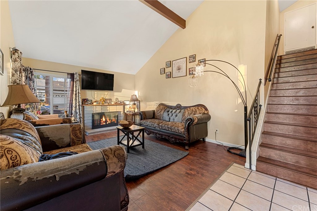 5005 Pearblossom Drive Riverside, CA 92507 - Photo 5 of 19 a living room with furniture and a flat screen tv