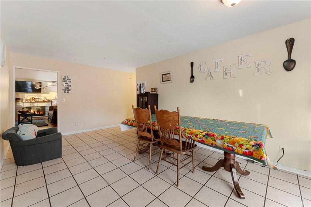 5005 Pearblossom Drive Riverside, CA 92507 - Photo 9 of 19 a living room with furniture and wooden floor