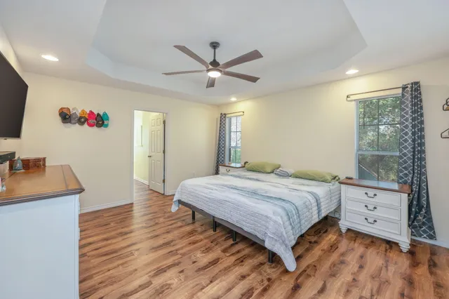 a bedroom with a bed and a dresser