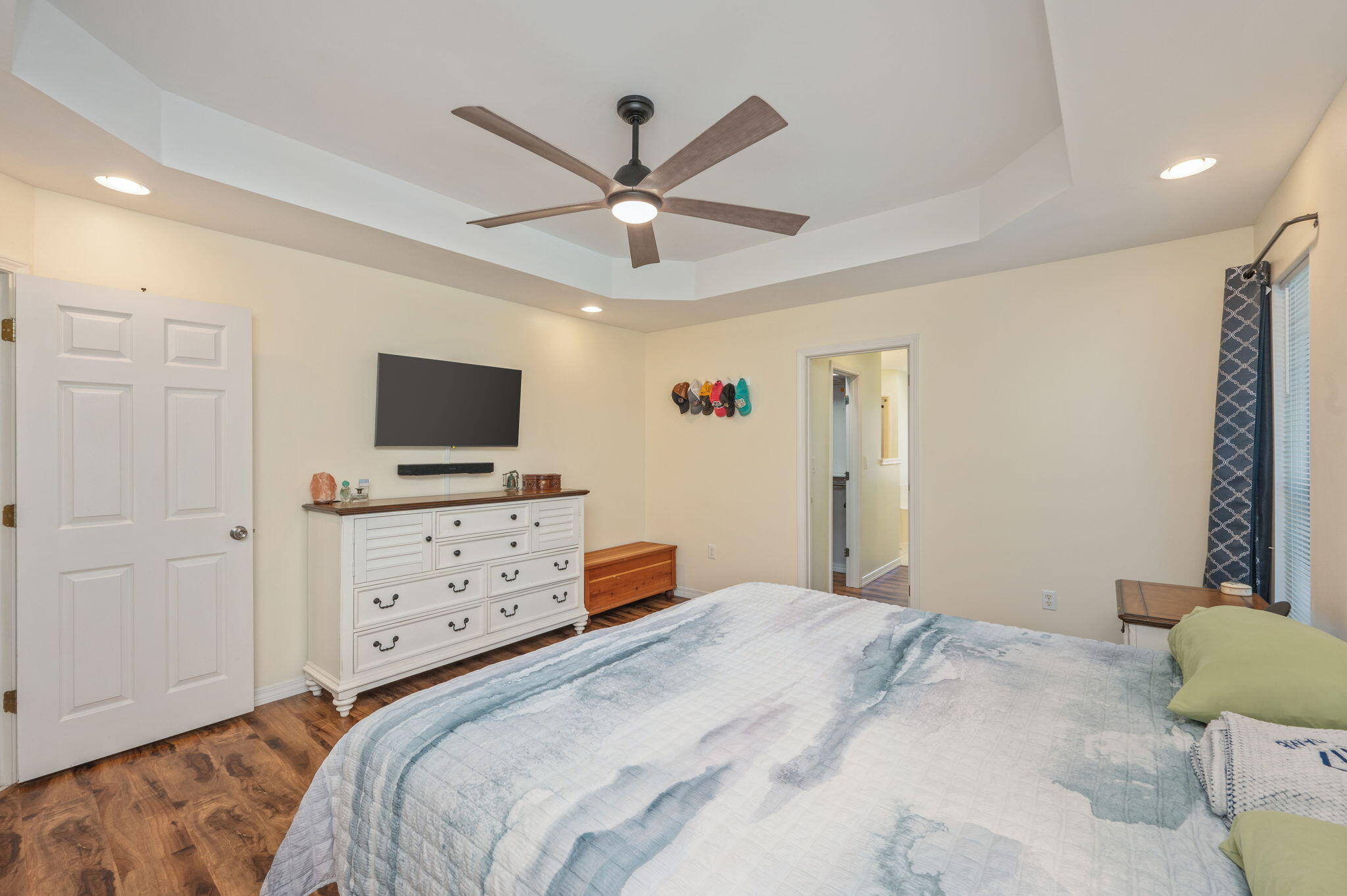 4654 Browning Court Crestview, FL 32539 - Photo 22 of 45 a bedroom with a bed window and a flat screen tv