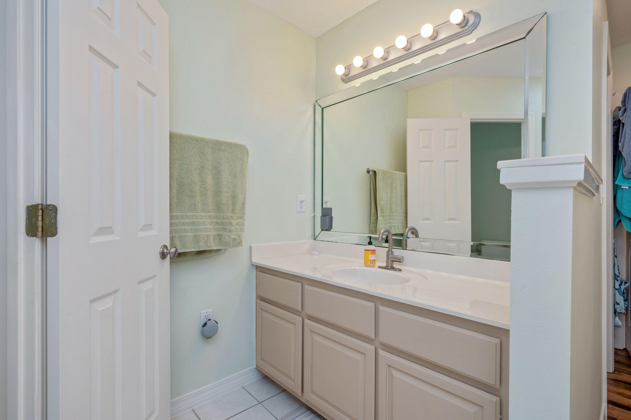4654 Browning Court Crestview, FL 32539 - Photo 24 of 45 a bathroom with a double vanity sink and a mirror