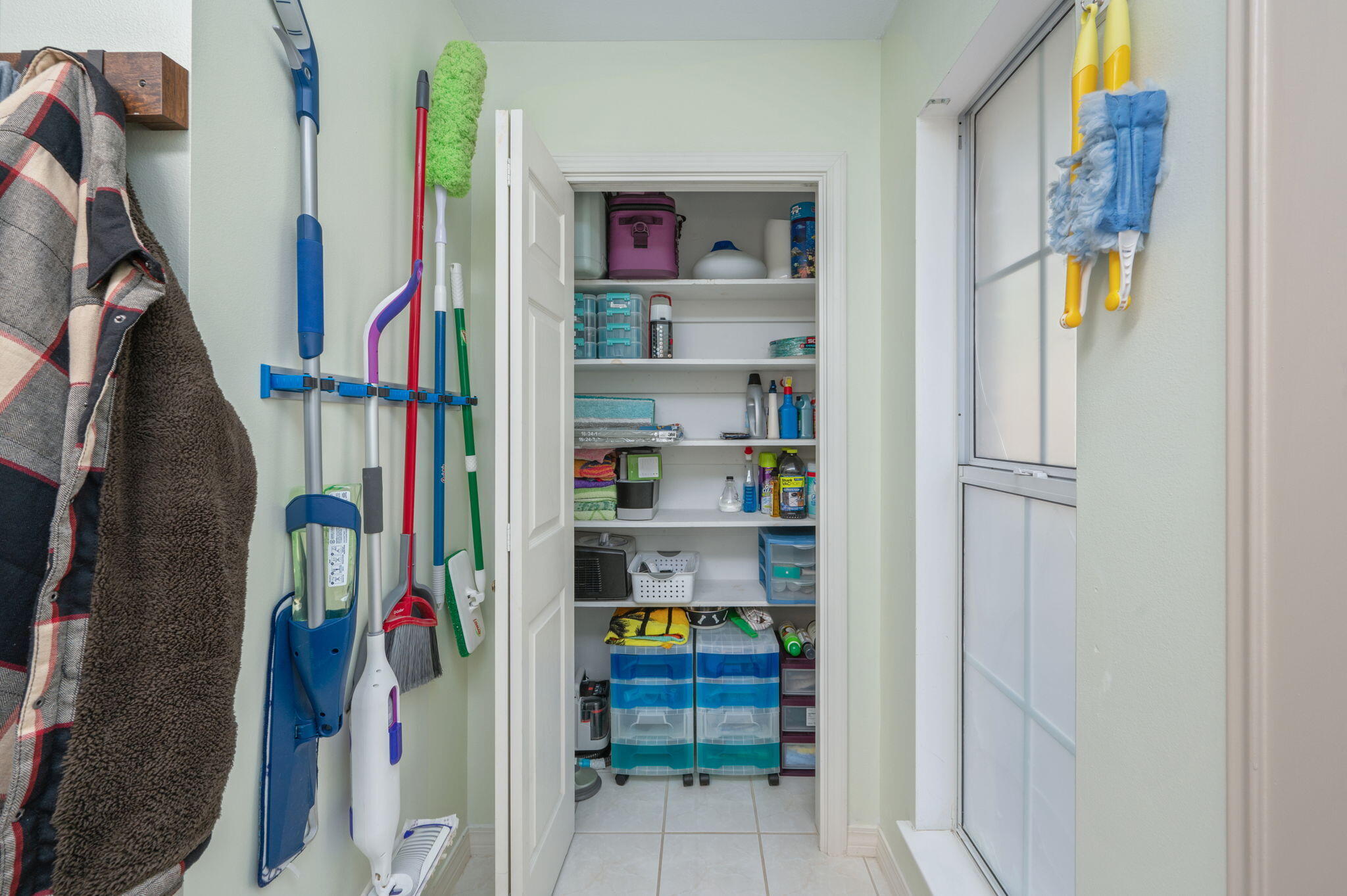 4654 Browning Court Crestview, FL 32539 - Photo 33 of 45 a view of walk in closet with clothes and shoes