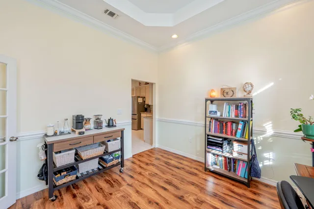 a room with a book shelf and a book shelf