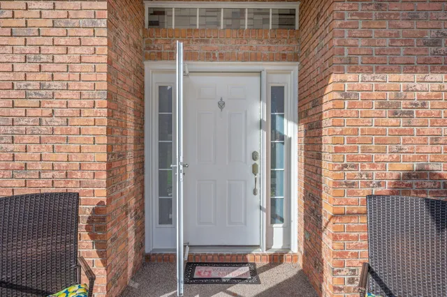 a front view of a house with a door