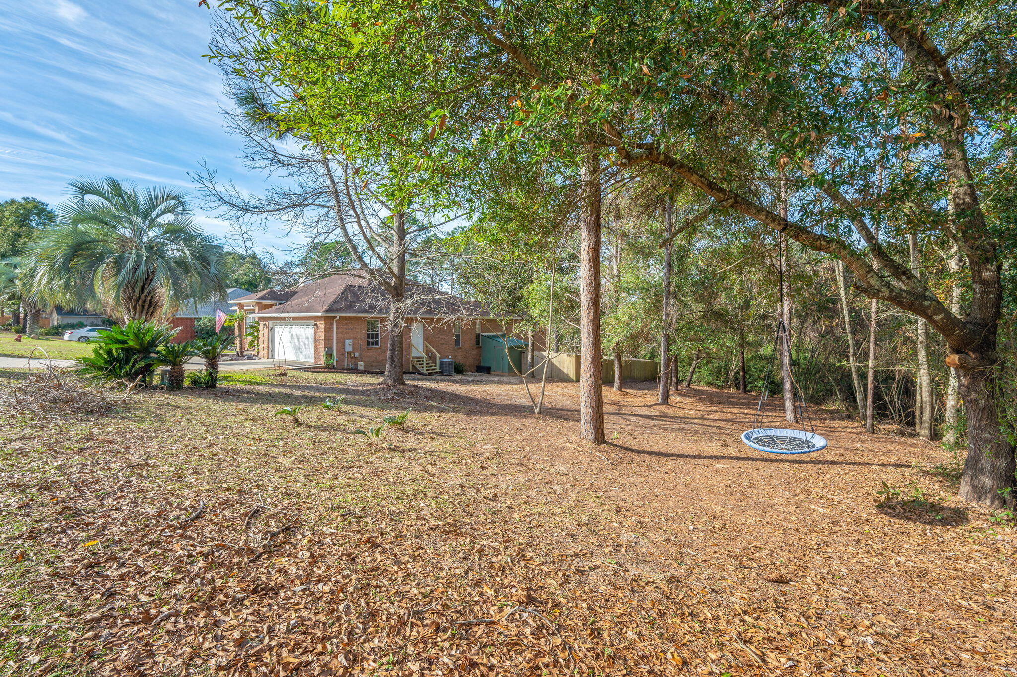 4654 Browning Court Crestview, FL 32539 - Photo 45 of 45 a house with trees in the background