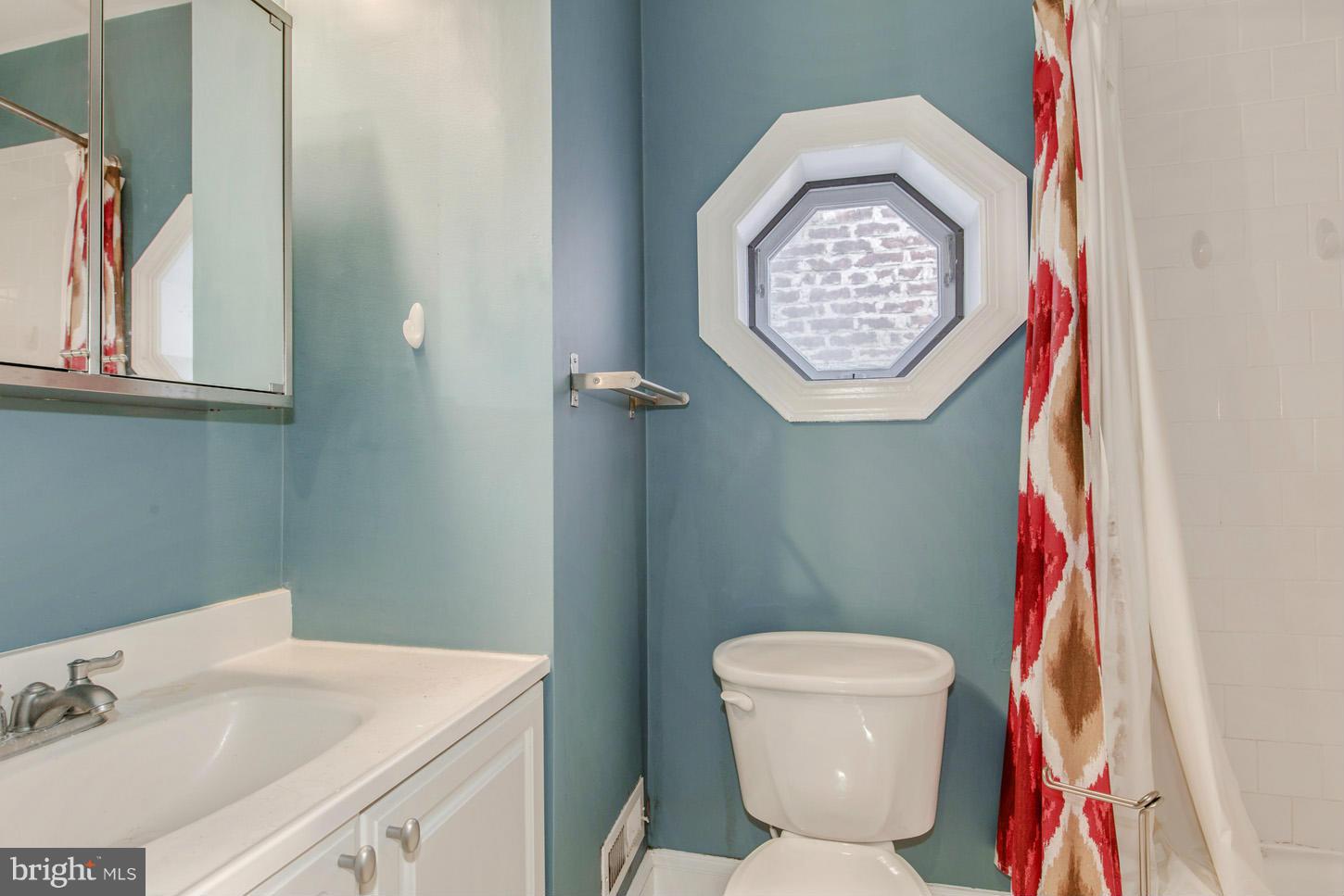 245 10th Street Northeast Washington, DC 20002 - Photo 15 of 17 a bathroom with a toilet and a sink