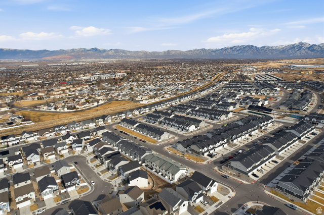 3808 Galatia Road Magna, UT 84044 - Photo 47 of 59 Expansive aerial perspective showcasing a developed residential area with a mountain range backdrop