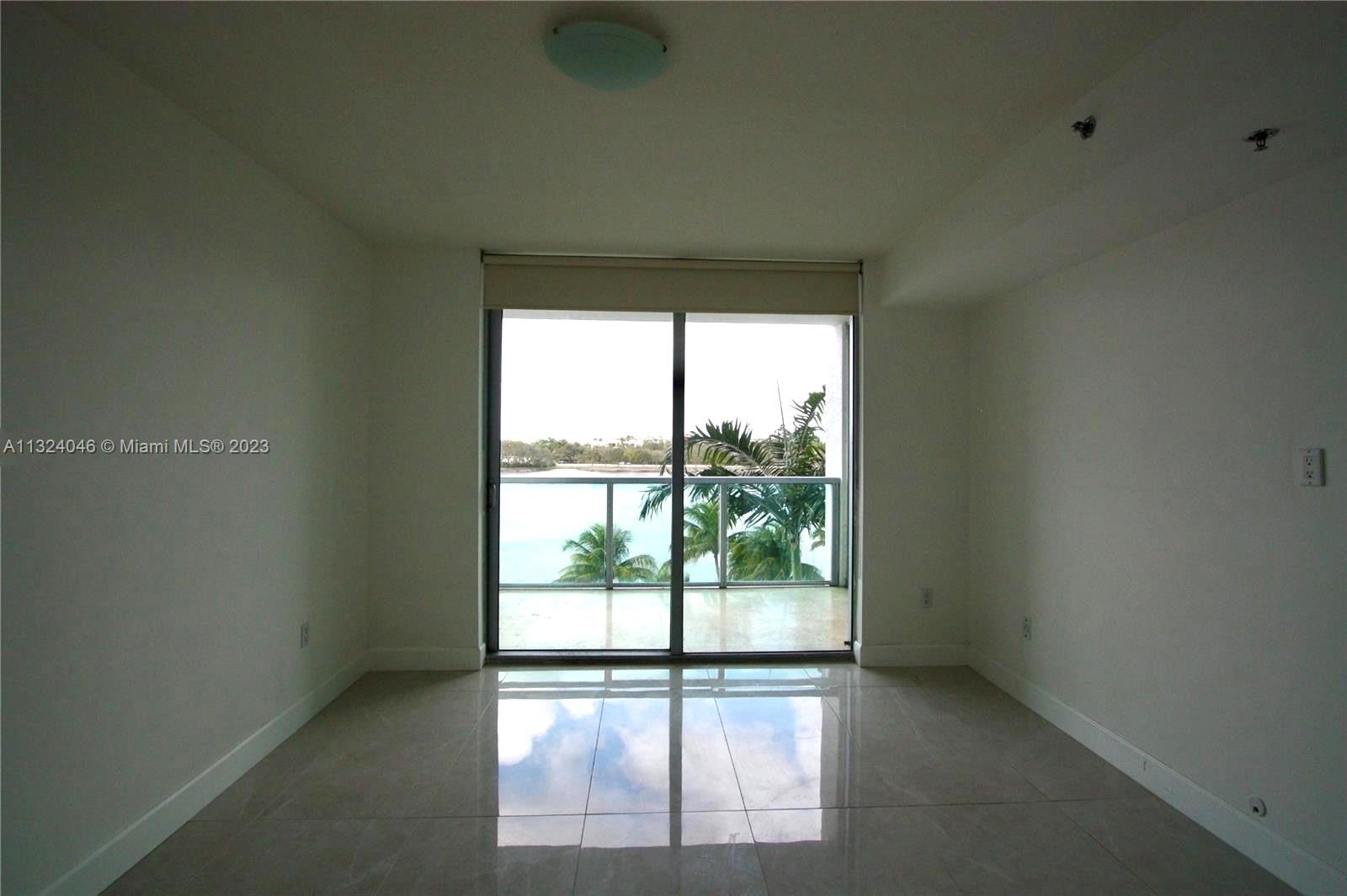2681 North Flamingo Road, Unit 506S Sunrise, FL 33323 - Photo 11 of 20 an empty room with a window