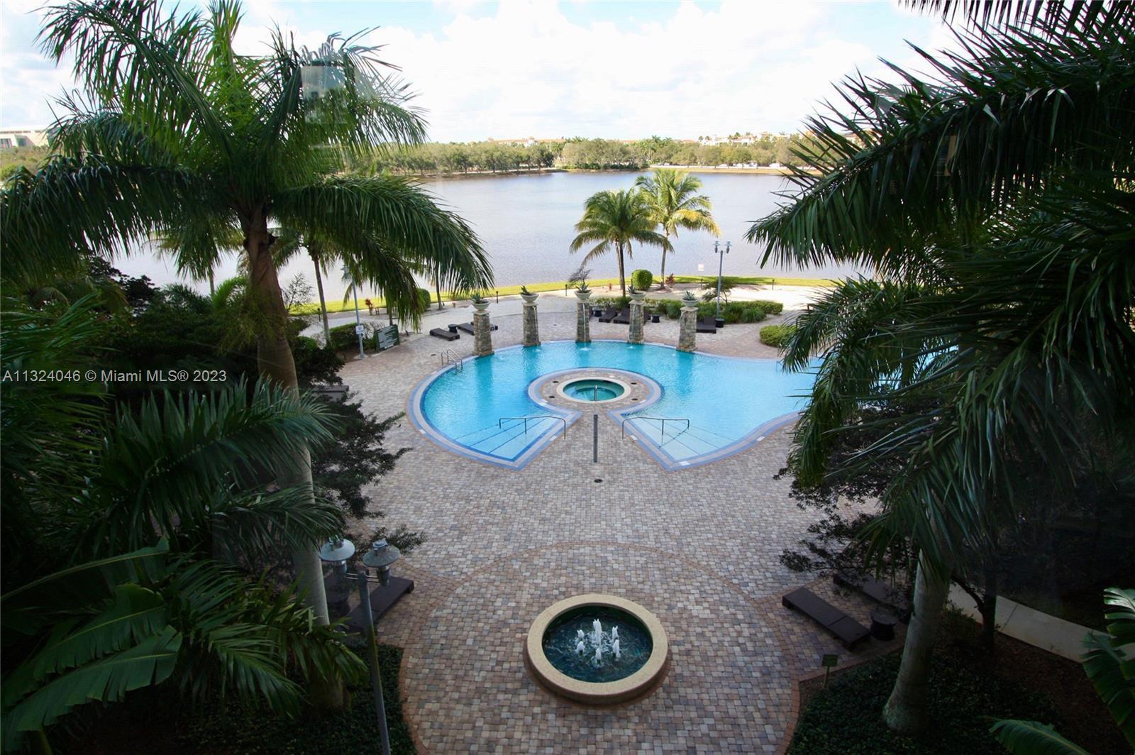 2681 North Flamingo Road, Unit 506S Sunrise, FL 33323 - Photo 16 of 20 an aerial view of a house with outdoor space and lake view in back