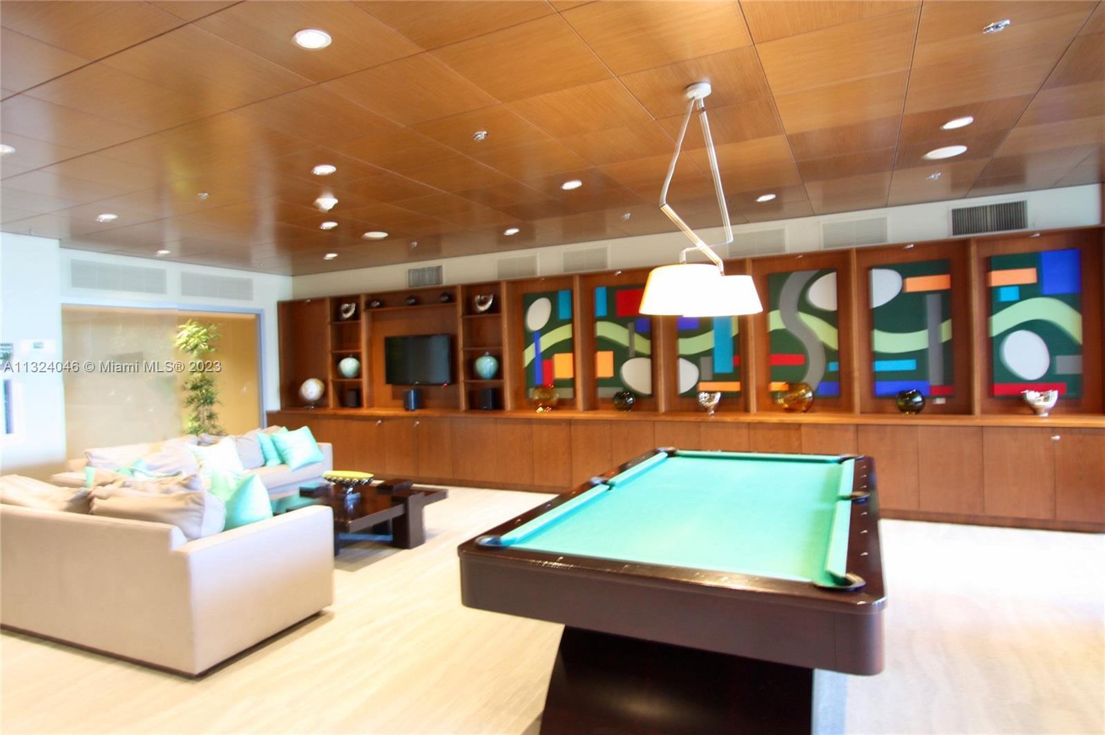 2681 North Flamingo Road, Unit 506S Sunrise, FL 33323 - Photo 17 of 20 a room with pool table and windows