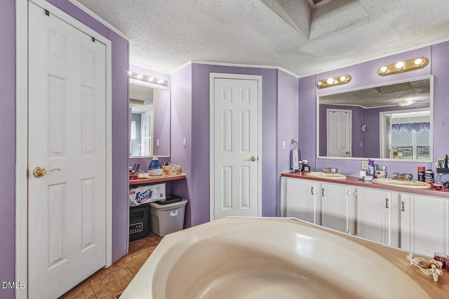 3663 Chewning Road Oxford, NC 27565 - Photo 12 of 43 a kitchen with stainless steel appliances a sink and cabinets
